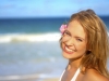 Fashion Shot of a Beautiful Young Woman on the Beach